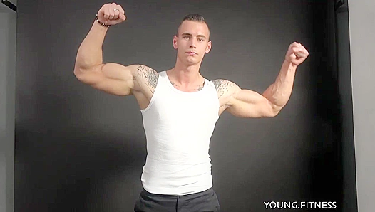 Glistening Muscle Worship: EastBoys Hunk Smothers His Ripped Abs in Oil, Arousing Viewers