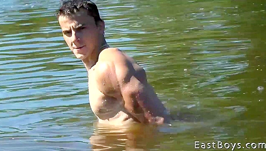Oiled Muscles on Full Display: Ronnies Scorching RV Handjob Session Ignites with EastBoys