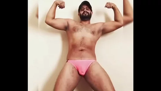 Muscular Middle Eastern Stud Showcases Thick Shaft Straining Against Snug Swimwear –