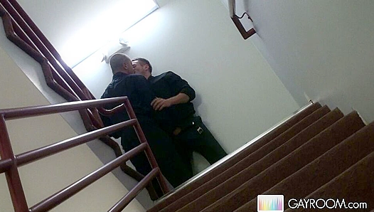 Steamy Stairwell Tryst: Hung Mens Throes of Lust Ignite Face-Fucking Frenzy – GayXXX